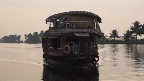 Houseboat gliding along Alappuzha Backwaters, Kerala