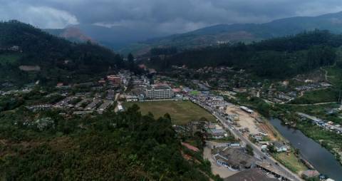 Bustling town nestled between mountains, Kerala