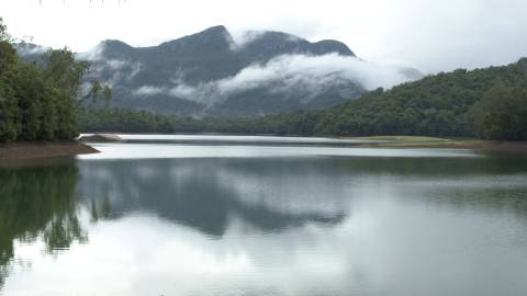 Slow moving clouds caressing a mountain