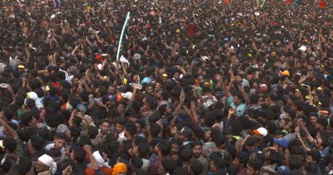 Crowd cheering for Thrissur Pooram festival