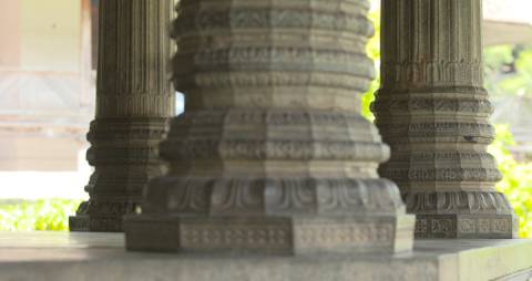 Carved granite pillars at Kuthiramalika Palace Museum, Thiruvananthapuram