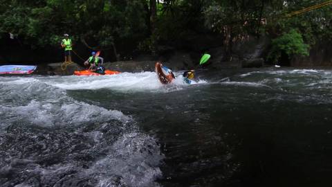 Tourists trying their hand at River Kayaking, Kerala
