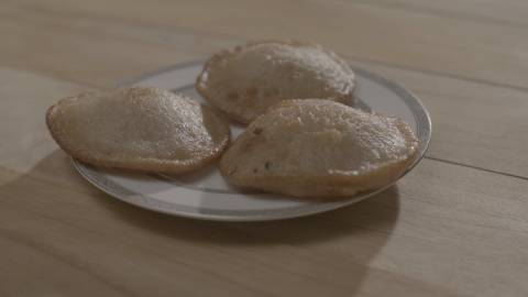 A plate of Neyyappam, a traditional Kerala snack