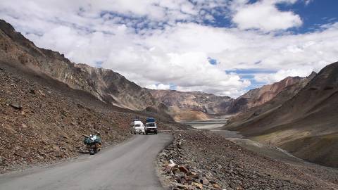 Tourist vehicles along the winding Leh-Keylong road,  India