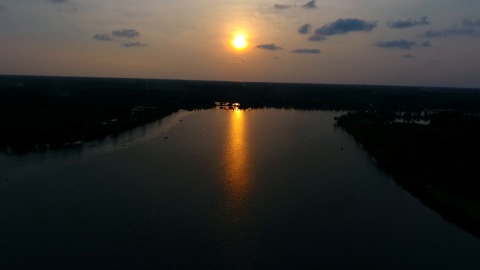 River reflects golden sun rays