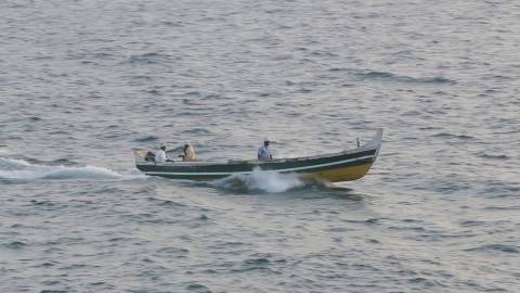Fishermen sailing across Vizhinjam Sea, Kerala