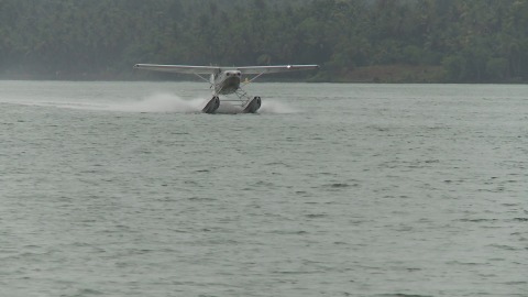 Seaplane displaces water in a lake in Kerala