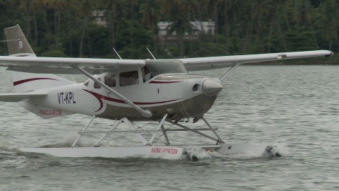 Seaplane lands on a lake in Kerala