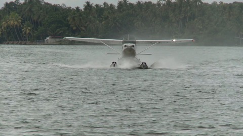 Seaplane lands on a lake in Kerala