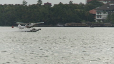 Seaplane takes off from a lake in Kerala