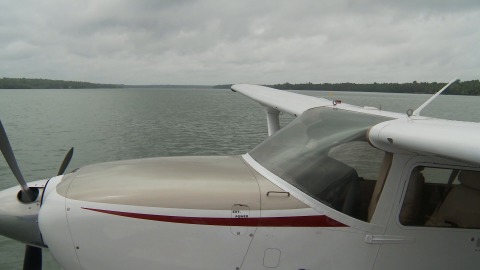 Sweeping shot of seaplane and its surrounding lake
