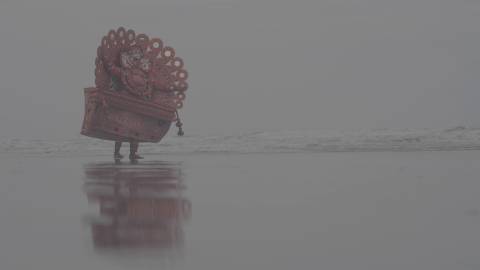 Theyyam artist on a beach, Kerala