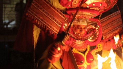 Theyyam performance at night