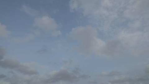 Clouds moving in blue sky