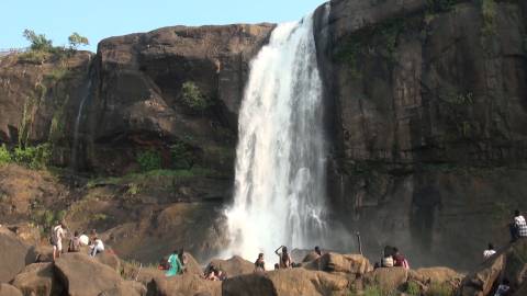 People enjoying at the Thirukkurungudi waterfalls