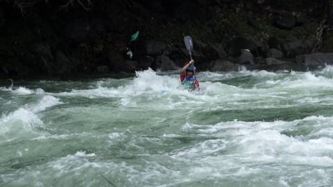 Athlete participating in a River Kayaking championship